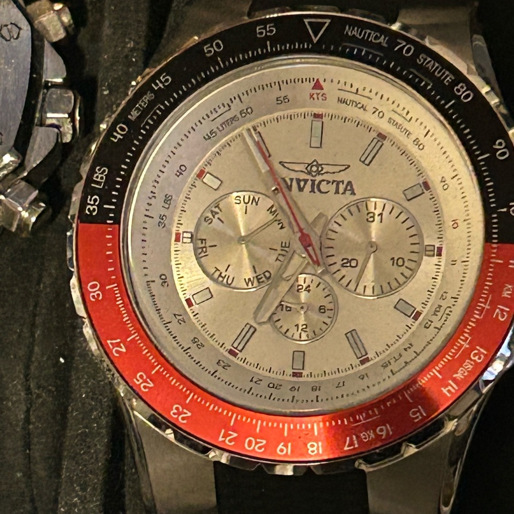 Invicta Silver Watch with Red and Black Bezel